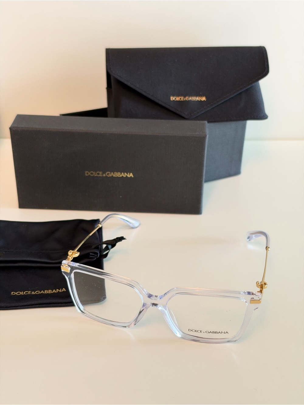 Dolce & Gabbana Clear and Gold Framed Women's Glasses